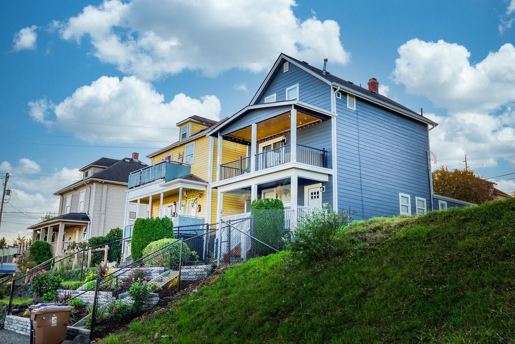 two historic homes on the hillside above UWT in downtown tacoma on a sunny day