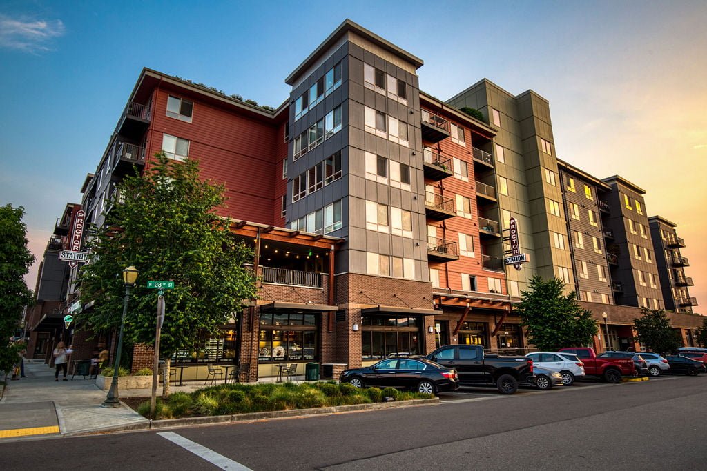 photo of proctor station apartments in proctor tacoma at sunset