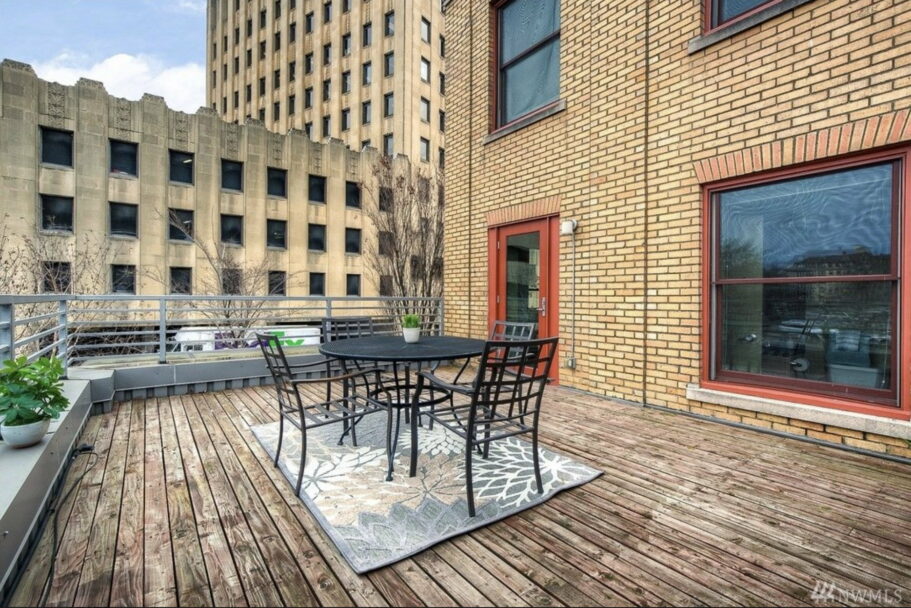 a rooftop deck at the bridge condominiums