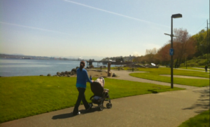 Woman with stroller on ruston way in tacoma wa