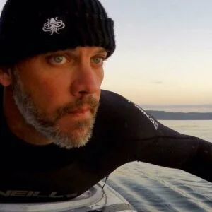 dean burke paddling on commencement bay