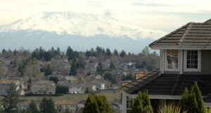 mt rainier above houses in browns point wa