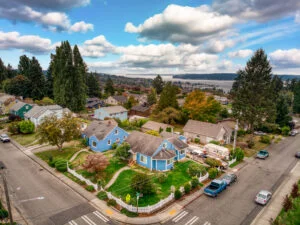 A blue home on a corner lot in the west end neighborhood tacoma