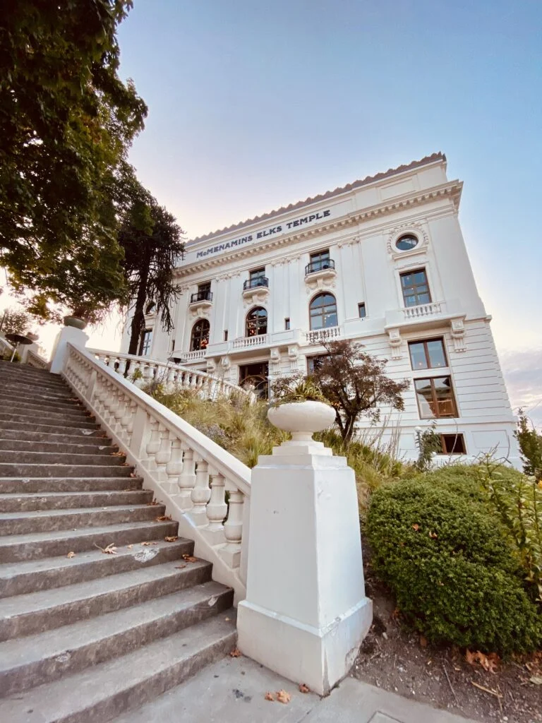 a photo of mcmenamins elks lodge hotel with the spanish steps in the foreground