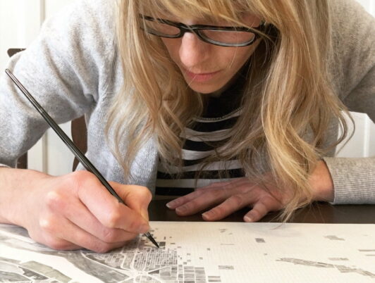 Kirsten Sparenborg is a Tacoma artist who creates Architectural Map Drawings. Kirsten moved to Tacoma's Stadium District when her husband PCSed to JBLM. After a brief move to New York Kirsten has returned to live and make art here in Tacoma. We talk about how she became a full time artist, creating and selling your art online, and being an artist in Tacoma, Washington. 