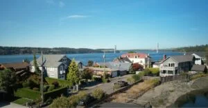 Day Island Neighborhood of Tacoma Washington photographed from above. The island is narrow, only a few homes wide.