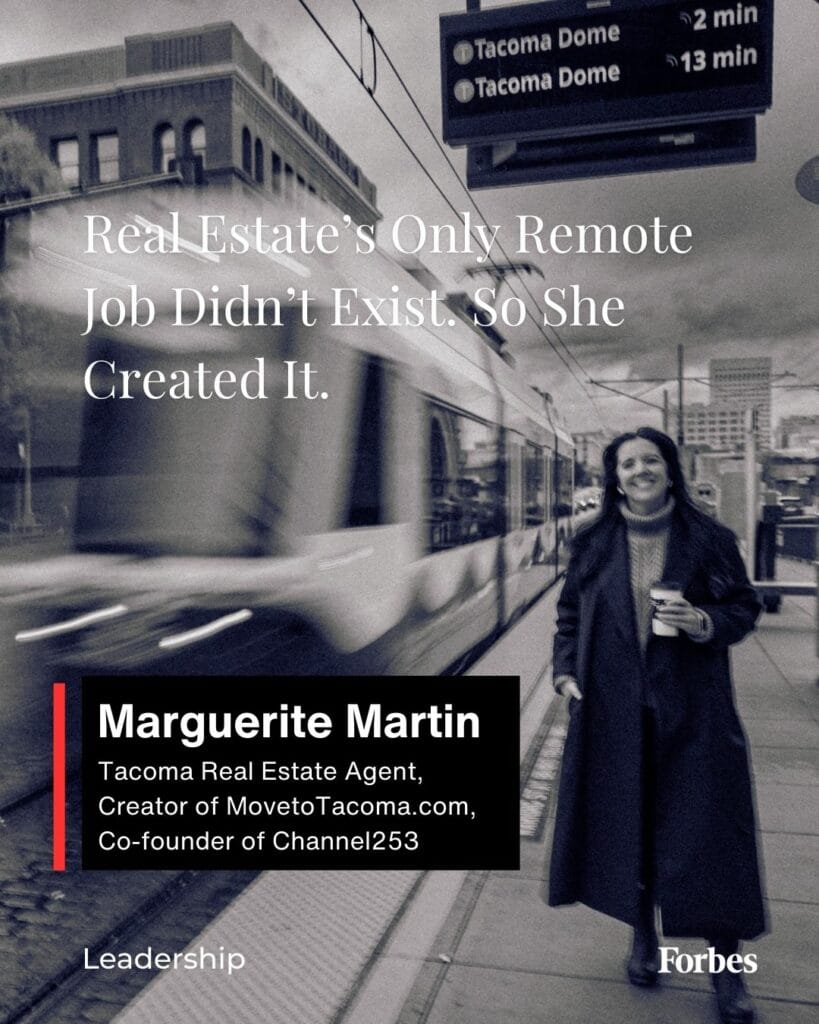 A black and white photo of Tacoma real estate agent Marguerite Martin standing in front of the T Line Streetcar in downtown Tacoma with the words "Leadership" "Forbes" and "Real Estate's Only Remote Job Didn't Exist. So She Created It."