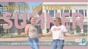 The words "What's it like living in Downtown Sumner" with Marguerite Martin and Kylee Hill standing in Downtown Sumner with their arms outstretched.